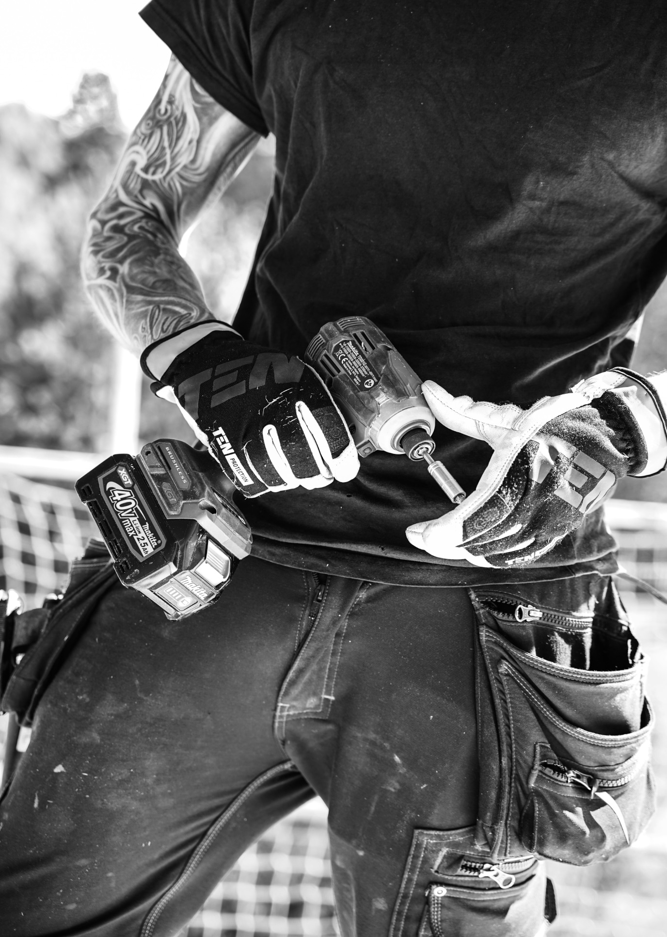 Handyman repairing a kitchen cabinet.